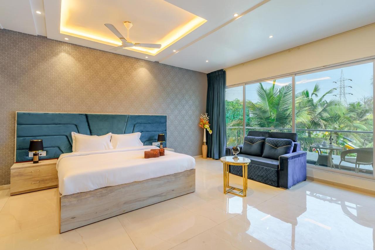 Saffronstays Palm Paradise, Kalyan Khadavli - Swimming Pool With Water Slides, Gazebo And Indoor Games Padghe Dış mekan fotoğraf