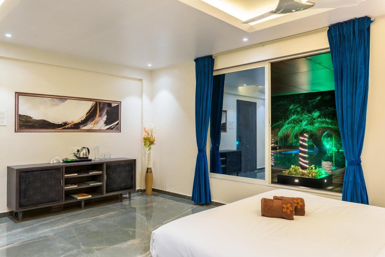 Saffronstays Palm Paradise, Kalyan Khadavli - Swimming Pool With Water Slides, Gazebo And Indoor Games Padghe Dış mekan fotoğraf